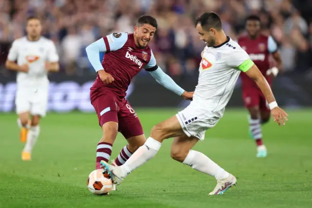 Fornals is challenged in midfield.