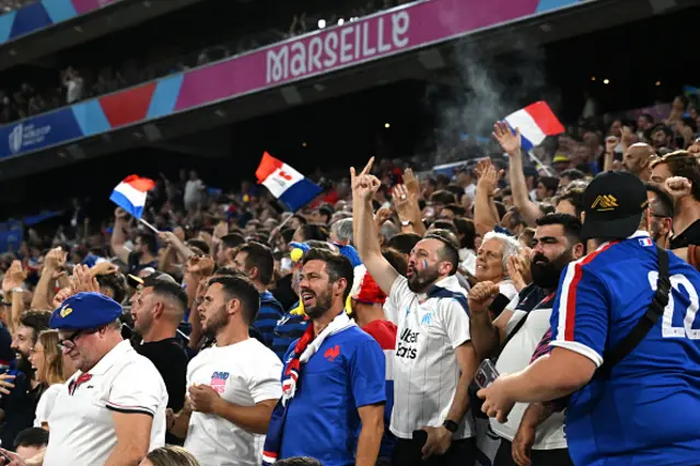 A general view of the inside of the stadium as French fans sing