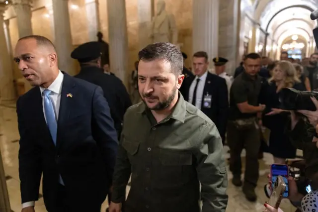 President Zelensky in a busy corridor at the US Capitol