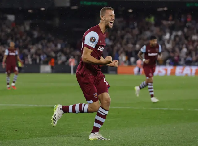 Soucek celebrates scoring West Ham's third with a fist pump.