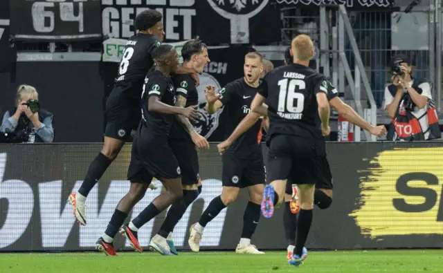 Frankfurt players surround Koch after his goal