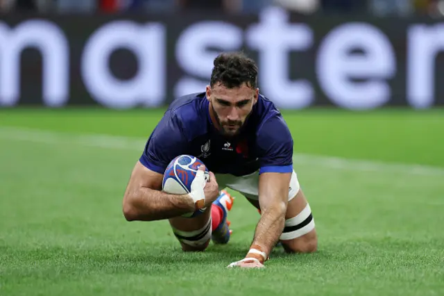 Charles Ollivon dives over the line to score a try