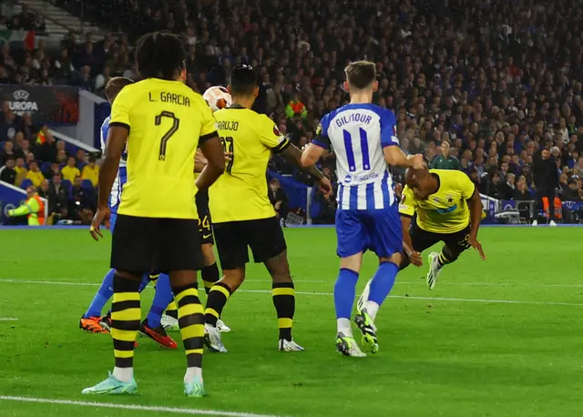 Sidibe dives to head the ball in from the corner.