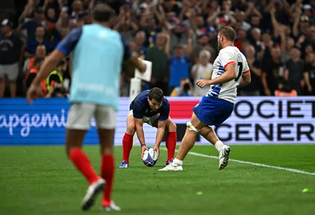 Antoine Dupont of France scores his team's seventh try