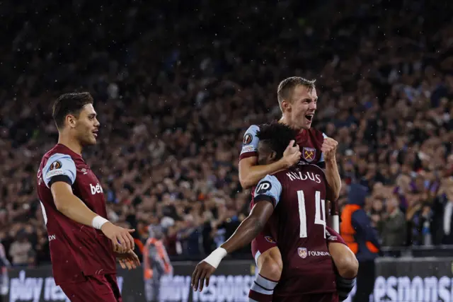 Kudus is mobbed by teammates after West Ham hit the front.