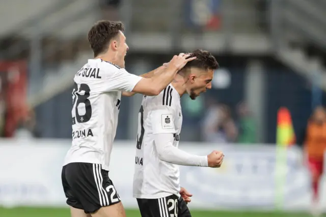 Marc Gual of Warsaw celebrates scoring for his side with a fist pump.