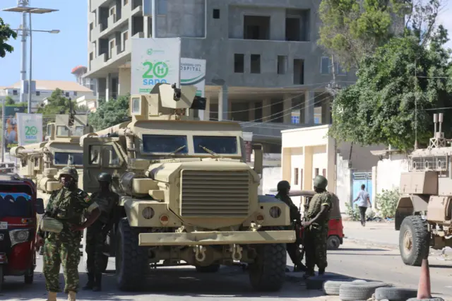 Security forces take security measures at the area after bomb attack during the passage of an African Union Transition Mission in Somalia (ATMIS) convoy in Mogadishu, Somalia on April 03, 2023