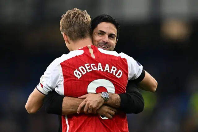 Mikel Arteta hugs Martin Odegaard