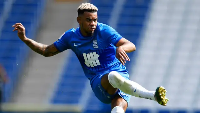 Juninho Bacuna swings for the ball in a pre-game warm-up for Birmingham