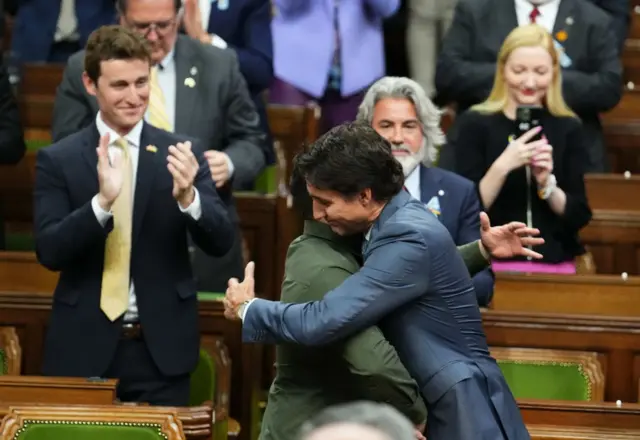 They hugged against inside the building where Zelensky delivered his address to lawmakers