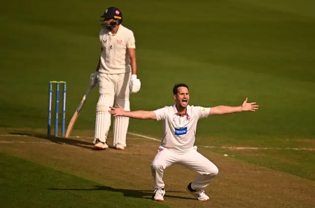 Lewis Gregory takes a wicket