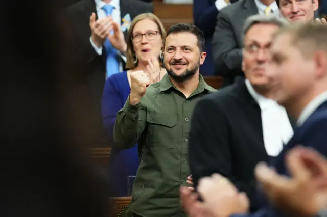 Zelensky was seen brandishing his fist triumphantly as Canadian lawmakers applauded for Ukraine