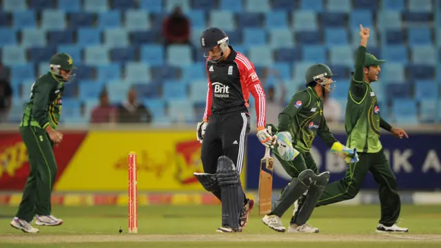 England's Jos Buttler walks off after being dismissed by Pakistan's Saeed Ajmal on his one-day international debut