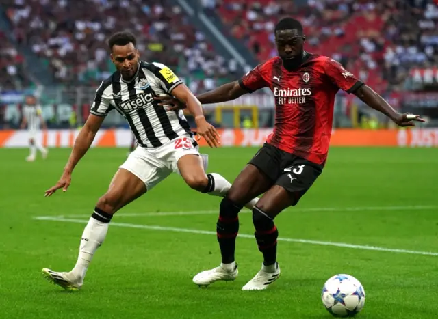 Newcastle winger Jacob Murphy playing against AC Milan