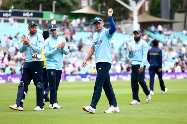 Sam Curran celebrates a five-wicket haul against Sri Lanka at The Oval by holding the ball aloft to the crowd