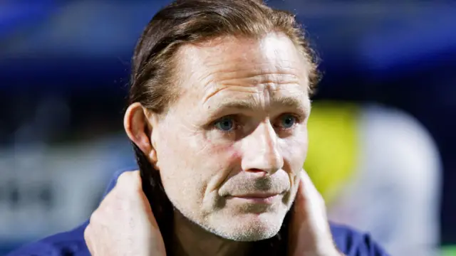 Gareth Ainsworth puts his hands behind his head during QPR's game with Swansea