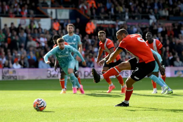 Carlton Morris of Luton Town scores their sides first goal