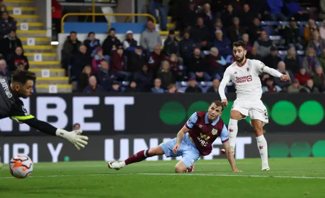 Fernandes smashes a volley beyond the reach of Trafford.