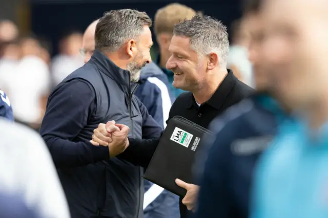 Derek McInnes and Tony Docherty say hello before kick-off