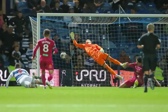 Swans keeper Carl Rushworth diving