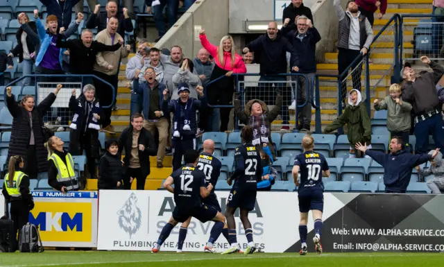 Dundee players celebrate