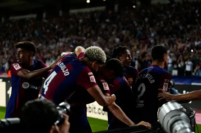 Joao Cancelo right-back of Barcelona and Portugal celebrates after scoring his sides first goal during the LaLiga EA Sports match between FC Barcelona and Celta Vigo at Estadi Olimpic Lluis Companys on September 23, 2023 in Barcelona, Spain.