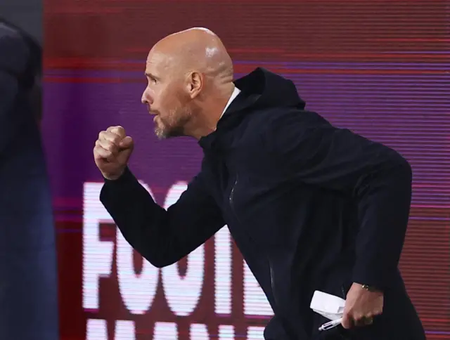 Ten Hag celebrates the opener for United with a fist pump.