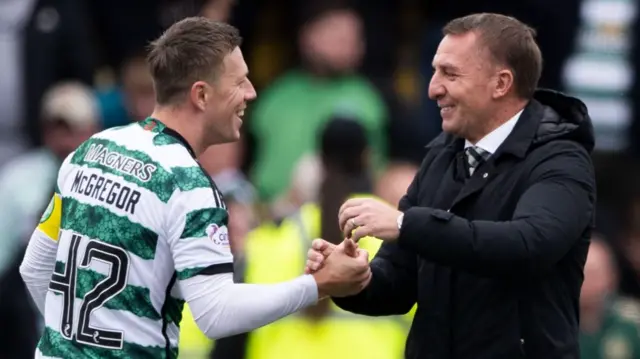 Celtic's Callum McGregor and Brendan Rodgers celebrate