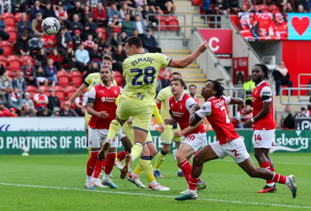 Milutin Osmajic heads at goal at Rotherham