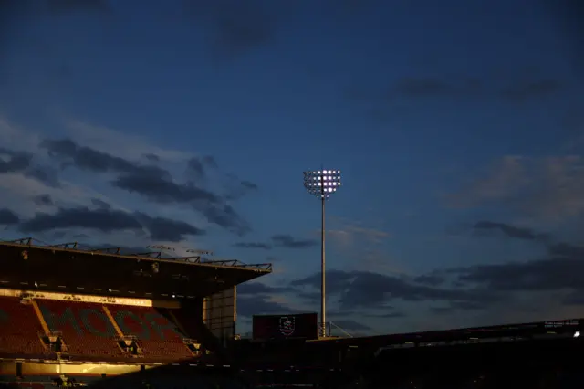 Turf Moor is bathed in sunlight as the sun sets ahead of the match.