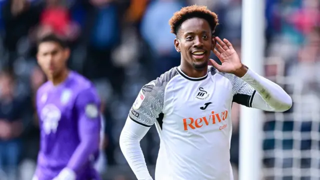 Jamal Lowe celebrates scoring for Swansea