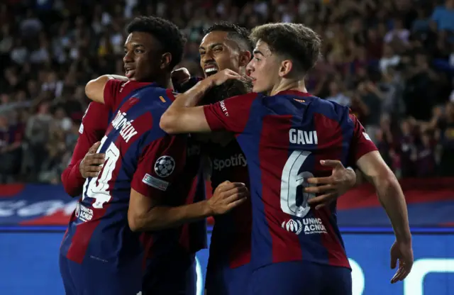 Barcelona players celebrate a goal v Royal Antwerp in the Champions League