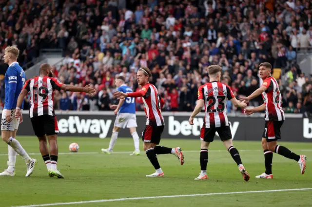 Mathias Jensen celebrates