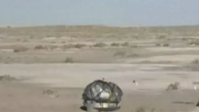 The capsule wrapped up in a protective blanket