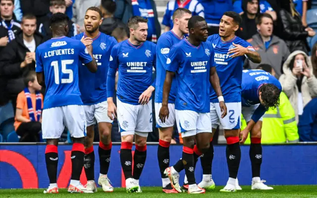 Rangers celebrate the breakthrough goal at Ibrox