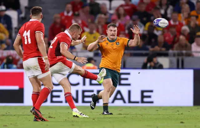 Gareth Anscombe of Wales kicks a drop goal