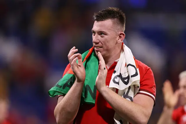 Adam Beard applauds the crowd after the game