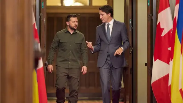 resident Volodymyr Zelensky with Canada's Prime Minister Justin Trudeau on their way to a meeting in Ottawa