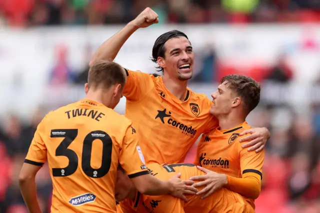 Hull City celebrate a goal at Stoke