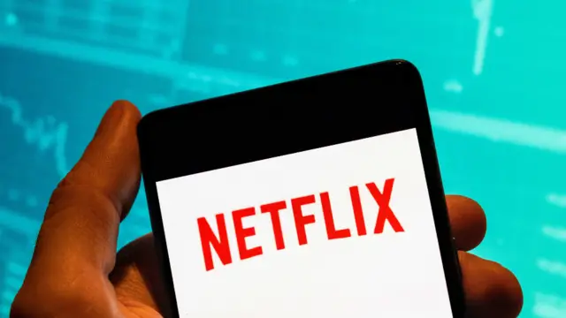 Netflix logo on a smartphone