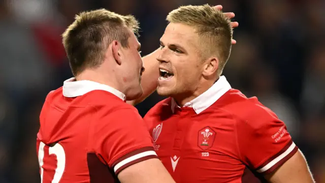 Gareth Anscombe celebrates with Nick Tompkins