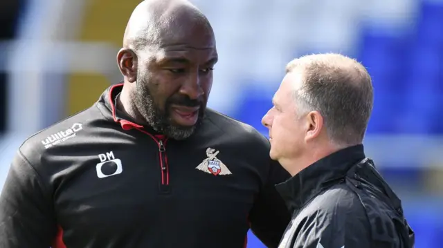 Darren Moore and Mark Robins last met up as rival bosses when Coventry hosted Moore's then club Doncaster Rovers at St Andrew's in 2019