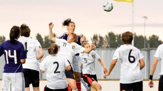 Scotland's Julie Fleeting rises to score against Belgium