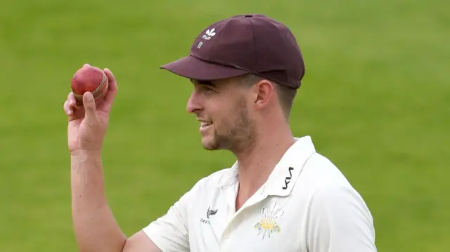 Tom Lawes acknowledges his 5-27 for Surrey