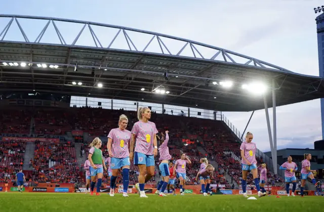 Players warm up in Utrecht ahead of the game.