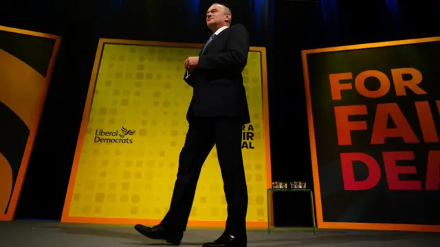 Liberal Democrat leader Ed Davey delivers his keynote speech during the Liberal Democrat conference at the Bournemouth Conference Centre