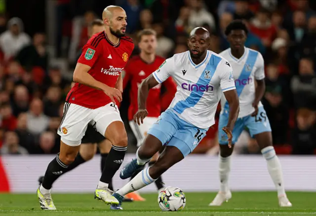 Sofyan Amrabat of Manchester United and Jean-Philippe Mateta of Crystal Palace