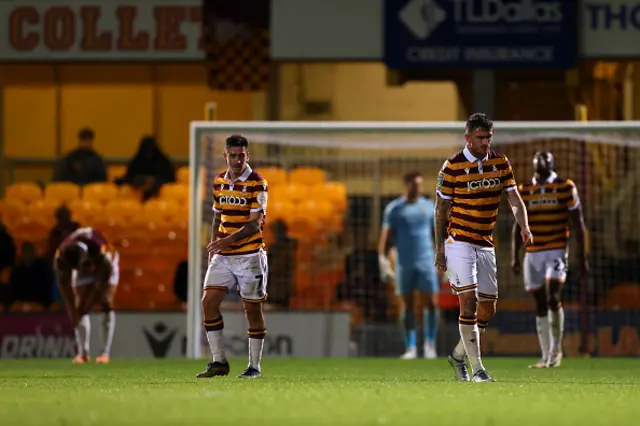 Andy Cook of Bradford City looks dejected after Morgan Rodgers goal