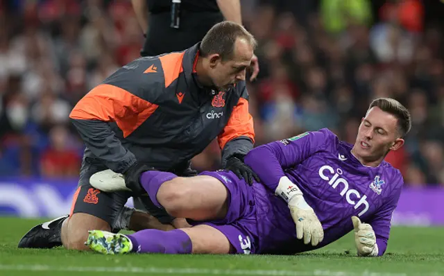 Dean Henderson of Crystal Palace receives treatment