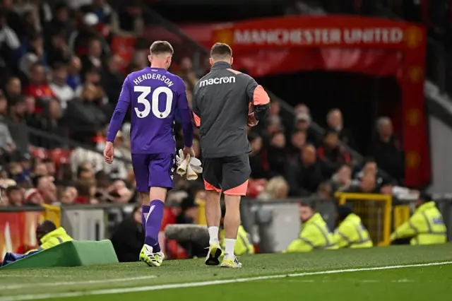 Dean Henderson walks off the pitch at Old Trafford